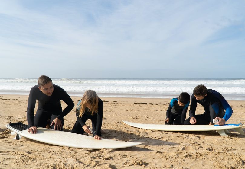 Exploring water sports: Basic equipment for surfing, kayaking, and stand-up paddleboarding.