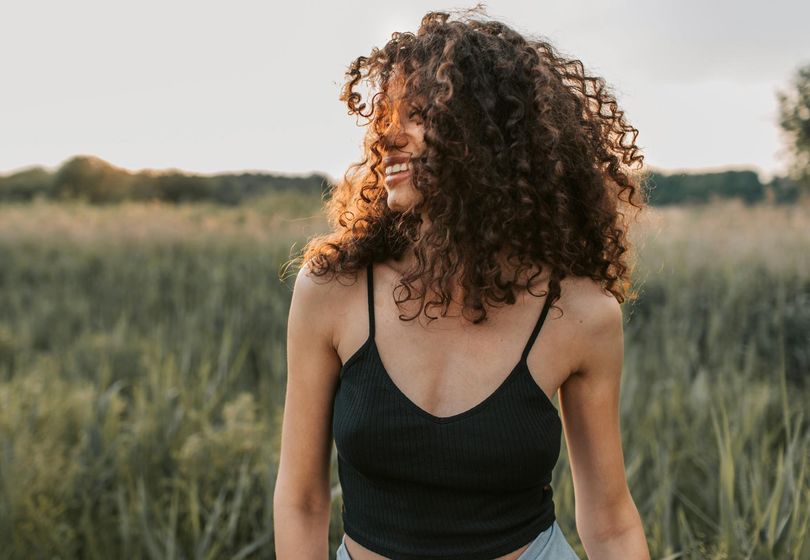 How to Brush Curly Hair Without Disrupting Your Curl Pattern